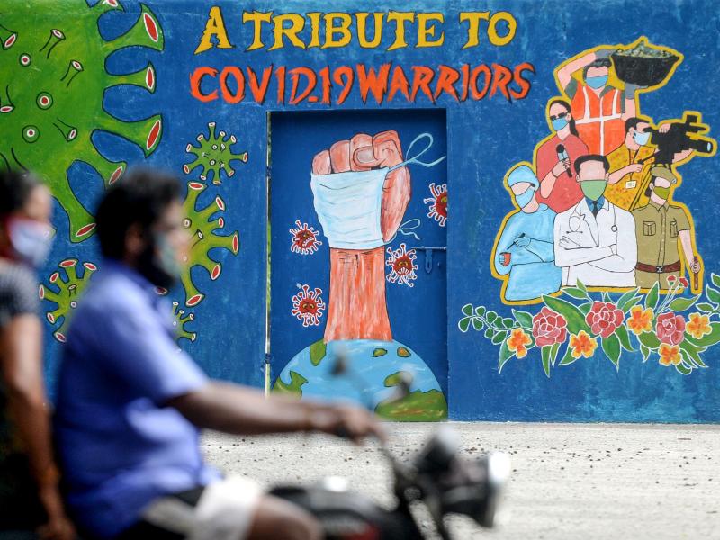 A mural in Chennai, India, celebrates workers on the front lines against the coronavirus pandemic. The global case count crossed the 20 million threshold on Monday, with the U.S., Brazil and India in the lead. A mural in Chennai, India, celebrates workers on the front lines against the coronavirus pandemic. The global case count crossed the 20 million threshold on Monday, with the U.S., Brazil and India in the lead.