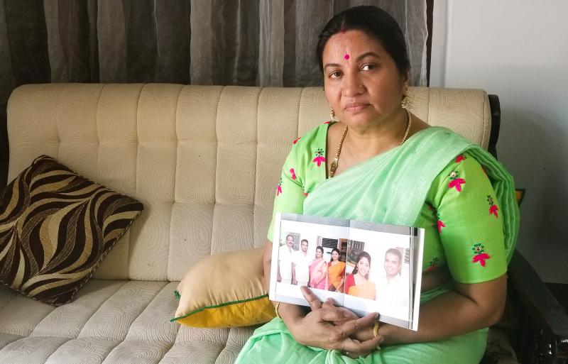 Bindu Sampath, 52, shows photos of her daughter Nimisha Sampath, now 29, who left India three years ago, after converting to Islam. She and her husband, a fellow Muslim convert, are wanted by Indian authorities for allegedly joining ISIS. They're believed Bindu Sampath, 52, shows photos of her daughter Nimisha Sampath, now 29, who left India three years ago, after converting to Islam. She and her husband, a fellow Muslim convert, are wanted by Indian authorities for allegedly joining ISIS. They're believed