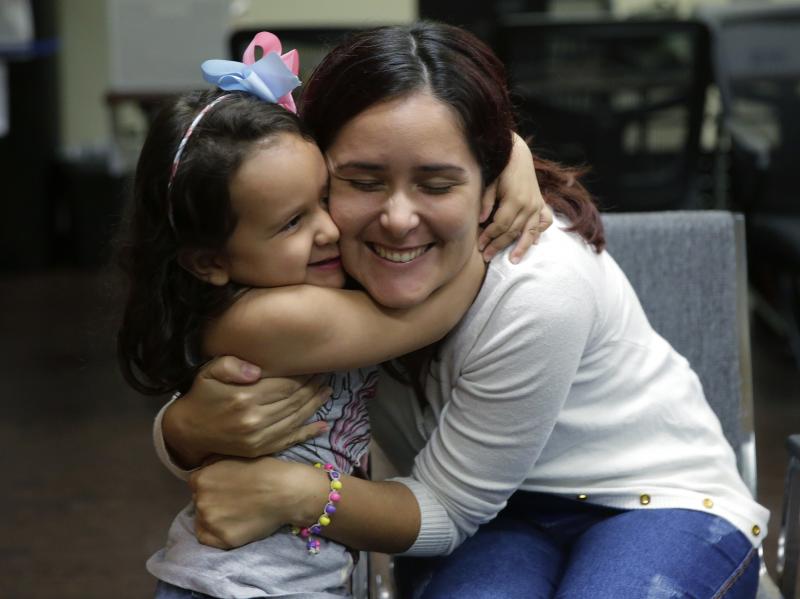 Natalia Oliveira da Silva and her daughter, Sara, 5, hug at a Catholic Charities facility in San Antonio, TX. They were separated in late May. Natalia Oliveira da Silva and her daughter, Sara, 5, hug at a Catholic Charities facility in San Antonio, TX. They were separated in late May.