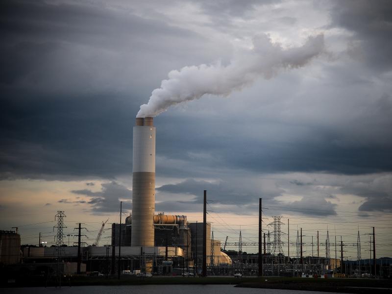Emissions rise from Duke Energy's coal-fired Asheville power plant in Arden, N.C., in 2018. Emissions rise from Duke Energy's coal-fired Asheville power plant in Arden, N.C., in 2018.