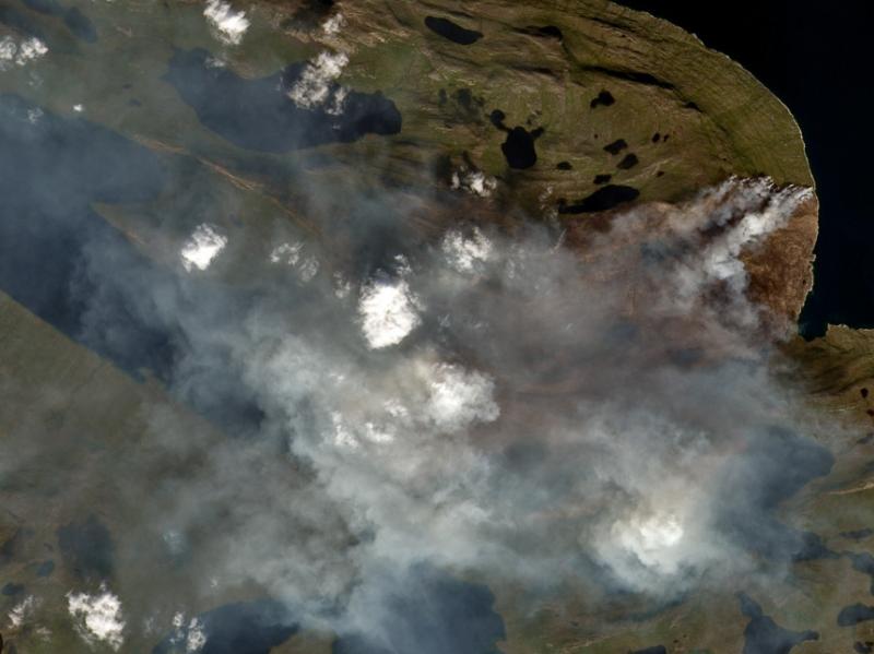 The wind direction from the fire in western Greenland has largely blown smoke toward the island's ice sheet and away from communities. The wind direction from the fire in western Greenland has largely blown smoke toward the island's ice sheet and away from communities.
