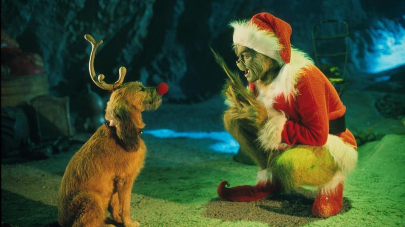 The Grinch, played by Jim Carrey, conspires with his dog Max to deprive the Whos of their favorite holiday in the live-action adaptation of "Dr. Seuss' How The Grinch Stole Christmas." The Grinch, played by Jim Carrey, conspires with his dog Max to deprive the Whos of their favorite holiday in the live-action adaptation of "Dr. Seuss' How The Grinch Stole Christmas."