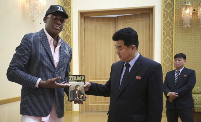 Former NBA star Dennis Rodman presents the book The Art of the Deal to North Korea's Sports Minister Kim Il Guk last June in Pyongyang, North Korea. Until this week, Rodman was believed to be the only person who had met both Kim and the U.S. president. Former NBA star Dennis Rodman presents the book The Art of the Deal to North Korea's Sports Minister Kim Il Guk last June in Pyongyang, North Korea. Until this week, Rodman was believed to be the only person who had met both Kim and the U.S. president.