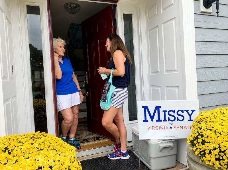 Canvassing for votes in Virginia Beach, Democrat Missy Cotter Smasal meets voter Mildred Manger. "It's just stupid that everybody has to have a gun," Manger says. "I mean, give me a break!" Canvassing for votes in Virginia Beach, Democrat Missy Cotter Smasal meets voter Mildred Manger. "It's just stupid that everybody has to have a gun," Manger says. "I mean, give me a break!"