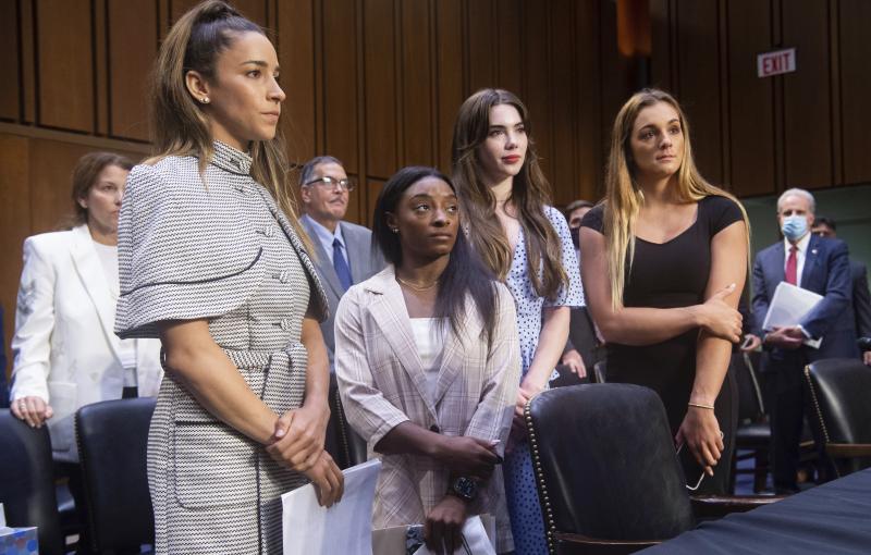 Gymnasts (from left) Aly Raisman, Simone Biles, McKayla Maroney and Maggie Nichols leave after testifying Wednesday at a Senate Judiciary Committee hearing on the FBI's handling of the Larry Nassar investigation. Nassar was charged in 2016 with federal ch Gymnasts (from left) Aly Raisman, Simone Biles, McKayla Maroney and Maggie Nichols leave after testifying Wednesday at a Senate Judiciary Committee hearing on the FBI's handling of the Larry Nassar investigation. Nassar was charged in 2016 with federal ch