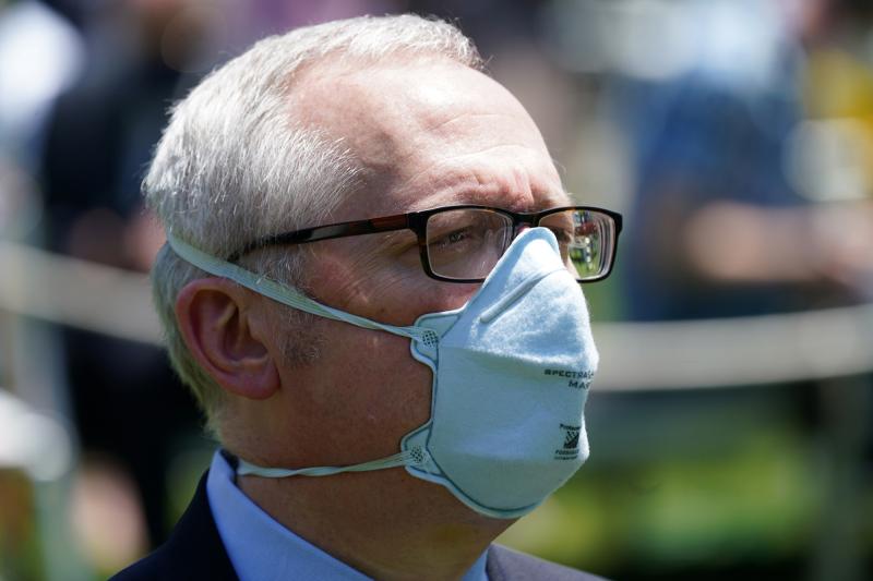 Michael Caputo, pictured at a White House event, is taking a 60-day leave of absence from his job as lead spokesperson for the Department of Health and Human Services after alleging President Trump's opponents have interfered in the coronavirus response. Michael Caputo, pictured at a White House event, is taking a 60-day leave of absence from his job as lead spokesperson for the Department of Health and Human Services after alleging President Trump's opponents have interfered in the coronavirus response.