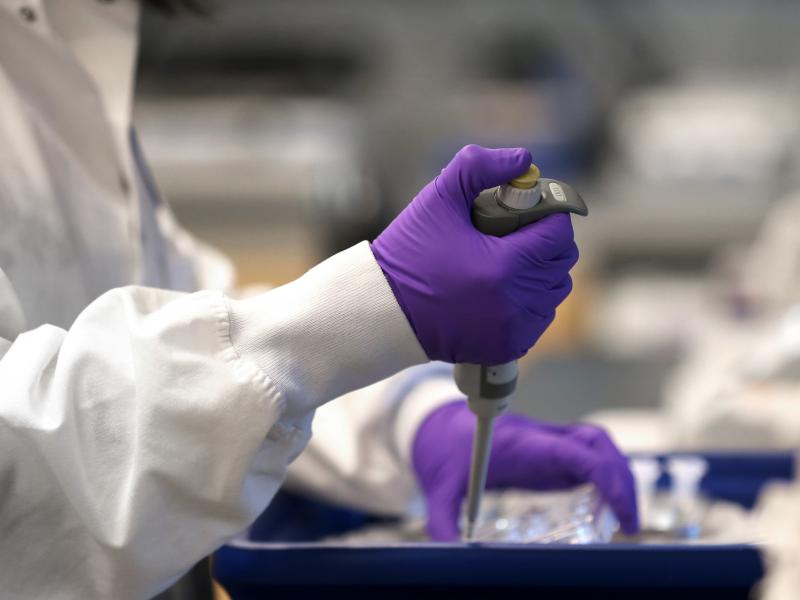 A scientist works in a lab at Moderna in Cambridge, Mass., in February. Moderna has developed an experimental coronavirus medicine, but an approved treatment could be more than a year away. A scientist works in a lab at Moderna in Cambridge, Mass., in February. Moderna has developed an experimental coronavirus medicine, but an approved treatment could be more than a year away.