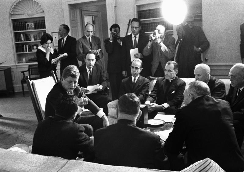 President John F. Kennedy and members of the Civil Rights Commission pose during a White House conference in Washington in 1961. Wofford is seated to Kennedy's left. President John F. Kennedy and members of the Civil Rights Commission pose during a White House conference in Washington in 1961. Wofford is seated to Kennedy's left.
