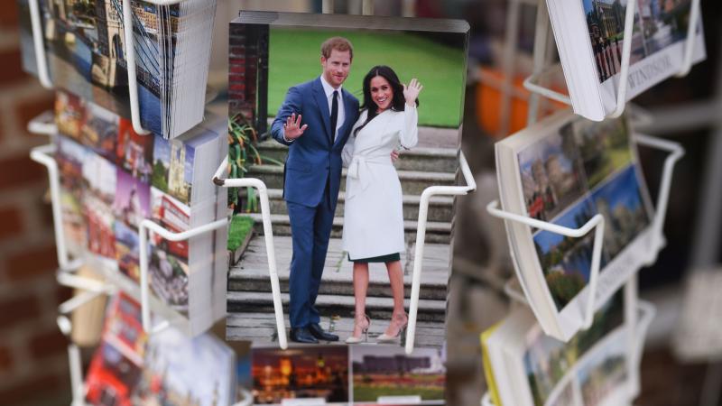 Prince Harry and Meghan Markle greet tourists from the glossy surface of a postcard sold Friday in Windsor. The pair — the real people, not their images, we mean — will wed at St. George's Chapel in Windsor Castle on Saturday. Prince Harry and Meghan Markle greet tourists from the glossy surface of a postcard sold Friday in Windsor. The pair — the real people, not their images, we mean — will wed at St. George's Chapel in Windsor Castle on Saturday.