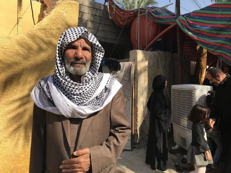 Khazaal Salih mourns his son, Abbas Salih, a medic who was shot and killed while he was treating a wounded protester in Baghdad. "By God, my son did nothing wrong," says Salih. Khazaal Salih mourns his son, Abbas Salih, a medic who was shot and killed while he was treating a wounded protester in Baghdad. "By God, my son did nothing wrong," says Salih.