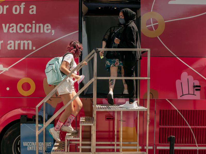 A teenager enters a pop-up COVID-19 vaccine site this month in the Jackson Heights neighborhood of Queens in New York City. A teenager enters a pop-up COVID-19 vaccine site this month in the Jackson Heights neighborhood of Queens in New York City.