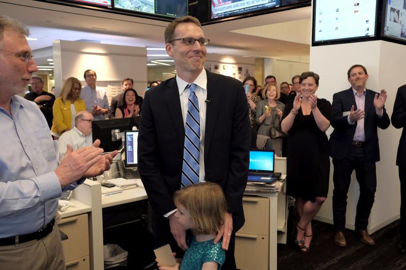 The Washington Post's David Fahrenthold (center) learns he won the 2017 Pulitzer Prize for national reporting, surrounded by his colleagues in the newsroom Monday. The Washington Post's David Fahrenthold (center) learns he won the 2017 Pulitzer Prize for national reporting, surrounded by his colleagues in the newsroom Monday.