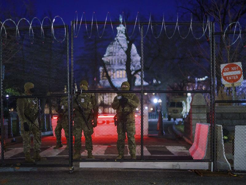 National Guard troops reinforce the security zone on Capitol Hill in Washington early Tuesday, before President-elect Joe Biden is sworn in as the 46th president on Wednesday. National Guard troops reinforce the security zone on Capitol Hill in Washington early Tuesday, before President-elect Joe Biden is sworn in as the 46th president on Wednesday.