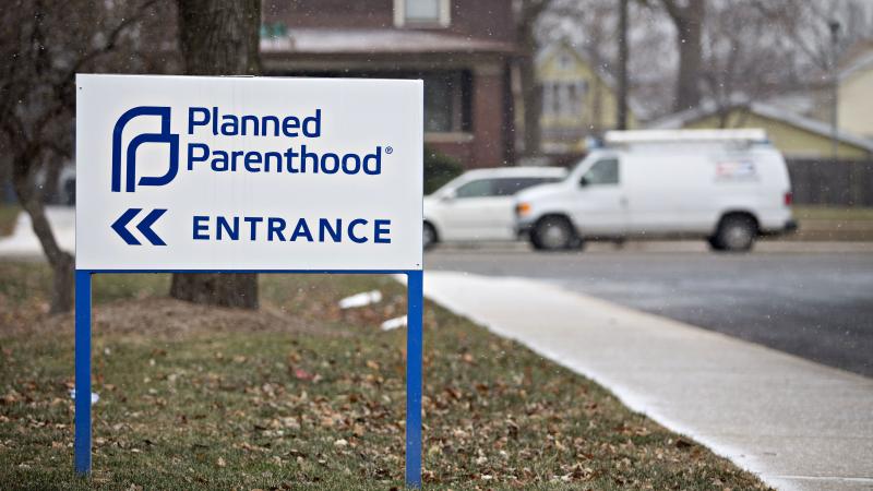 Signage is displayed outside a Planned Parenthood office in Peoria, Illinois, U.S., on Friday, Dec. 16, 2016. Signage is displayed outside a Planned Parenthood office in Peoria, Illinois, U.S., on Friday, Dec. 16, 2016.