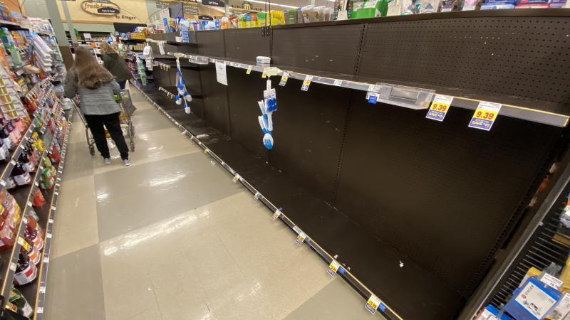 Shoppers found some empty shelves at a Kroger grocery store in Grosse Ile, Mich., on Friday. Americans are stocking up on food, toilet paper, water and other items amid the coronavirus outbreak. Shoppers found some empty shelves at a Kroger grocery store in Grosse Ile, Mich., on Friday. Americans are stocking up on food, toilet paper, water and other items amid the coronavirus outbreak.