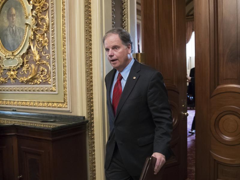 Former Sen. Doug Jones of Alabama, seen here in a 2018 file photo, has been tapped to help President Biden's to-be-named Supreme Court nominee through the Senate confirmation process. Former Sen. Doug Jones of Alabama, seen here in a 2018 file photo, has been tapped to help President Biden's to-be-named Supreme Court nominee through the Senate confirmation process.