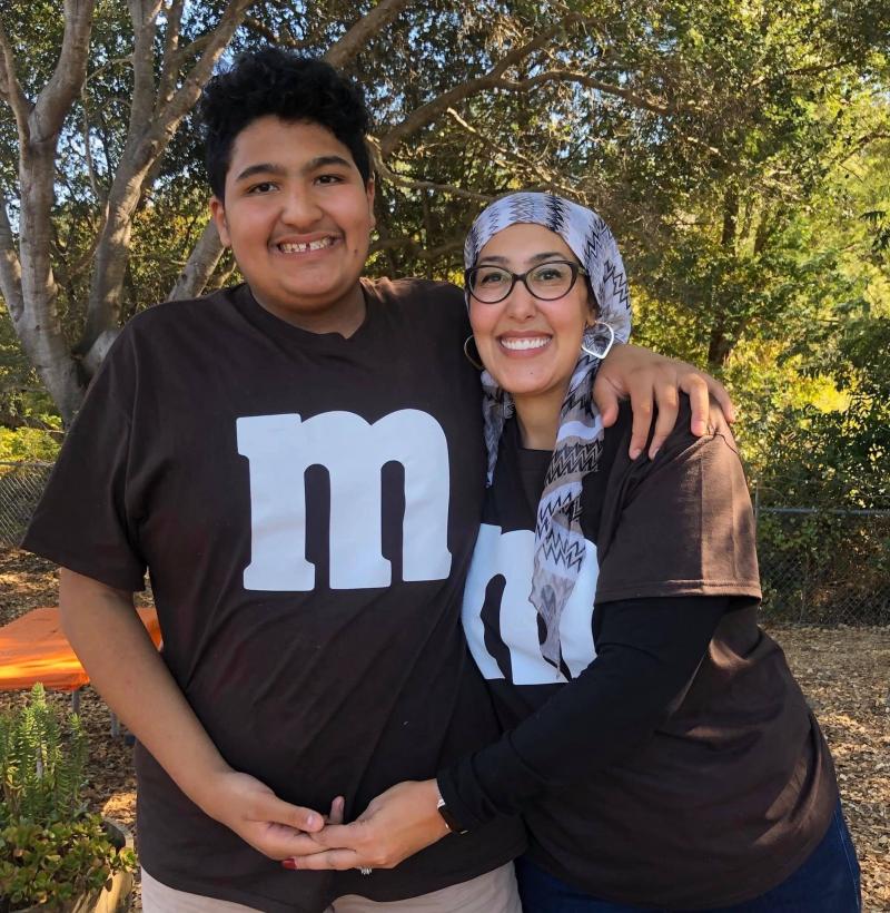 Feda Almaliti with her son, 15-year-old Muhammed, who has severe autism. "Muhammed is an energetic, loving boy who doesn't understand what's going on right now," she says. Feda Almaliti with her son, 15-year-old Muhammed, who has severe autism. "Muhammed is an energetic, loving boy who doesn't understand what's going on right now," she says.
