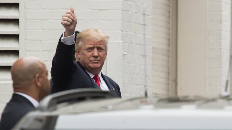 Donald Trump arrives at the Republican National Committee headquarters on Capitol Hill last week to meet with House Speaker Paul Ryan and other GOP leaders. Donald Trump arrives at the Republican National Committee headquarters on Capitol Hill last week to meet with House Speaker Paul Ryan and other GOP leaders.