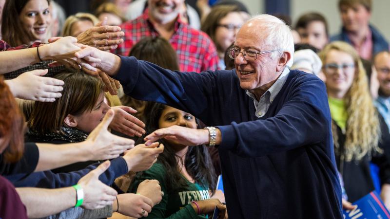 Sen. Bernie Sanders shakes hands with audience members after speaking at a campaign rally in Portsmouth, N.H. Sen. Bernie Sanders shakes hands with audience members after speaking at a campaign rally in Portsmouth, N.H.