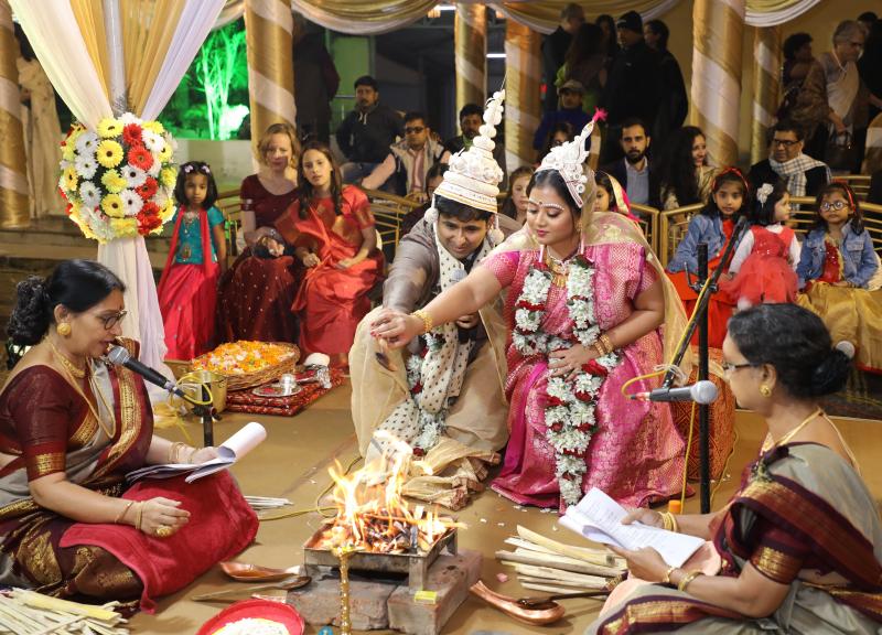 Sharmistha Chaudhuri (center, wearing pink), 35, at her wedding in Kolkata, India, in January 2020. Chaudhuri found some Indian wedding traditions retrograde, so she hired four feminist priestesses to officiate at hers. They performed a multilingual, egal Sharmistha Chaudhuri (center, wearing pink), 35, at her wedding in Kolkata, India, in January 2020. Chaudhuri found some Indian wedding traditions retrograde, so she hired four feminist priestesses to officiate at hers. They performed a multilingual, egal