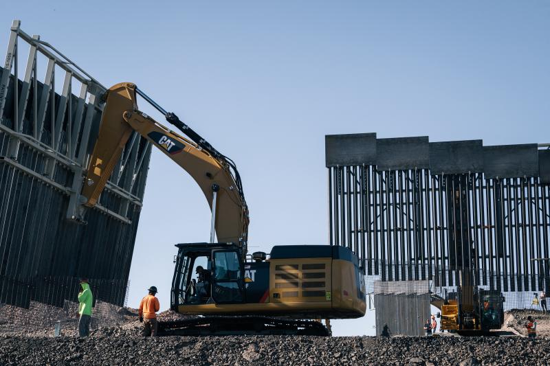 Fisher Industries workers move sections on May 24, 2019 in Sunland Park, N.M., near International Boundary Monument No. 1 where New Mexico, Texas and Mexico come together. Fisher Industries workers move sections on May 24, 2019 in Sunland Park, N.M., near International Boundary Monument No. 1 where New Mexico, Texas and Mexico come together.