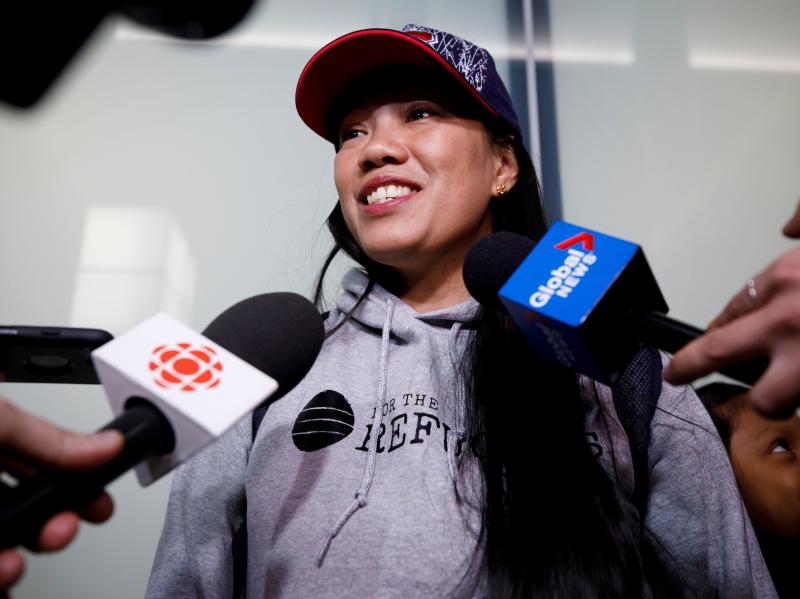 Vanessa Rodel smiles during a media scrum after arriving with her daughter Keana to the Toronto airport on a flight from Hong Kong this week. She is one of several Hong Kong-based refugees who helped Edward Snowden hide in Hong Kong after his leaks expose Vanessa Rodel smiles during a media scrum after arriving with her daughter Keana to the Toronto airport on a flight from Hong Kong this week. She is one of several Hong Kong-based refugees who helped Edward Snowden hide in Hong Kong after his leaks expose