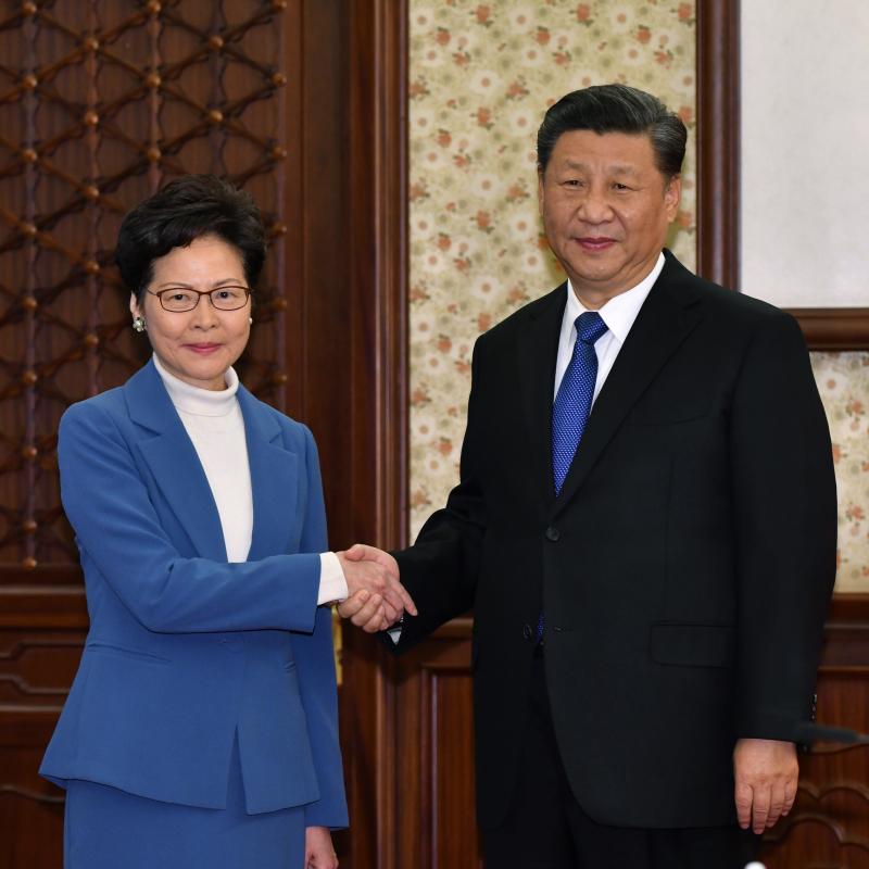 Hong Kong Chief Executive Carrie Lam shakes hands with Chinese President Xi Jinping in a gesture of solidarity Monday in Beijing. Hong Kong Chief Executive Carrie Lam shakes hands with Chinese President Xi Jinping in a gesture of solidarity Monday in Beijing.