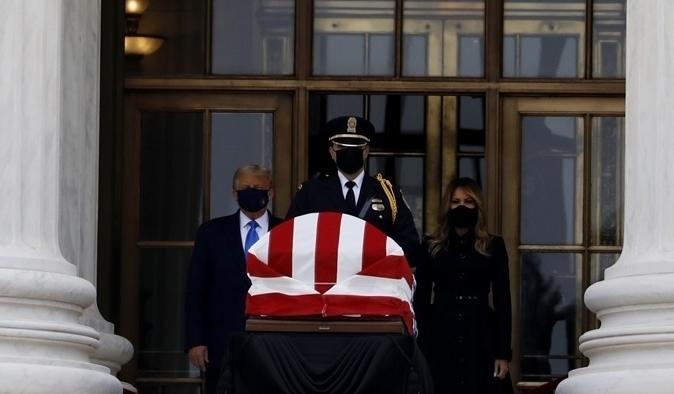 President Trump and first lady Melania Trump pay their respects to the late Justice Ruth Bader Ginsburg as she lies in repose at the U.S. Supreme Court. President Trump and first lady Melania Trump pay their respects to the late Justice Ruth Bader Ginsburg as she lies in repose at the U.S. Supreme Court.
