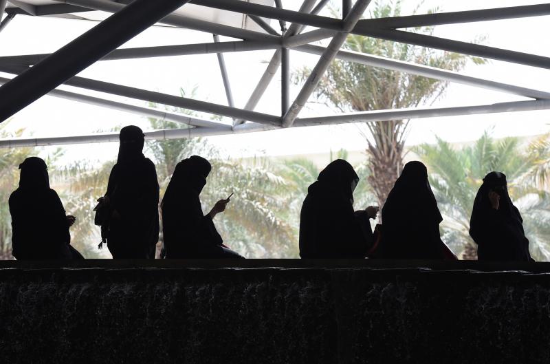 Saudi women wait for their drivers outside a hotel in the Saudi capital Riyadh. Saudi women wait for their drivers outside a hotel in the Saudi capital Riyadh.