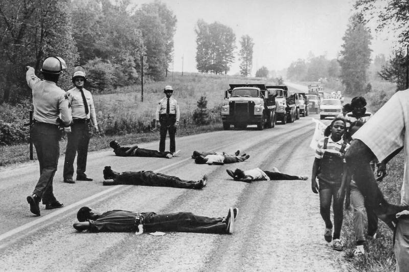 Protestors attempt to block the delivery of toxic PCB waste to a landfill in Warren County, North Carolina, 1982. It was in response to the State's decision to locate a hazardous waste landfill in a low-income, predominantly Black area of Warren County th Protestors attempt to block the delivery of toxic PCB waste to a landfill in Warren County, North Carolina, 1982. It was in response to the State's decision to locate a hazardous waste landfill in a low-income, predominantly Black area of Warren County th