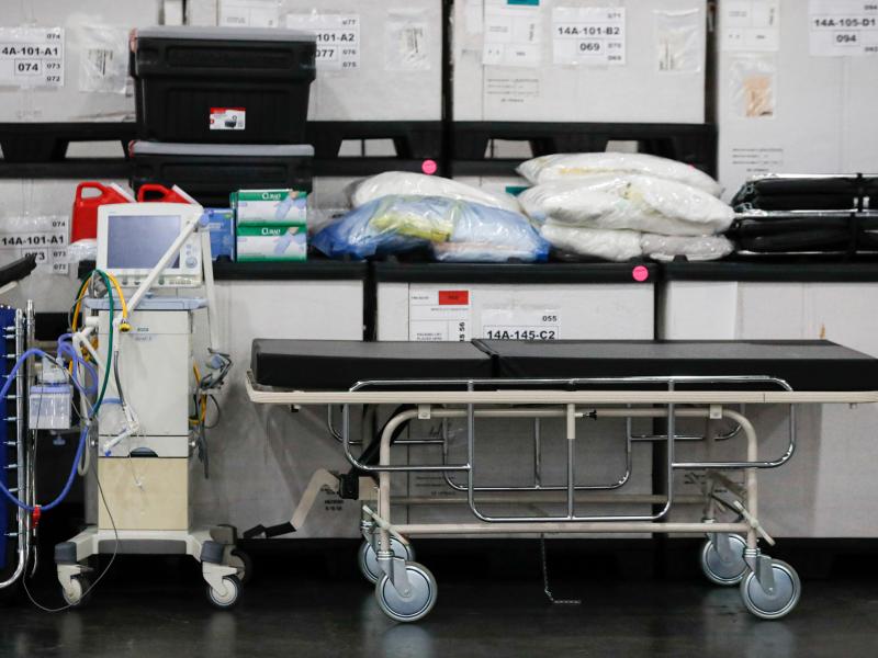 A ventilator alongside medical supplies and a stretcher is displayed before a news conference at the Javits Center in New York City on March 23. A ventilator alongside medical supplies and a stretcher is displayed before a news conference at the Javits Center in New York City on March 23.