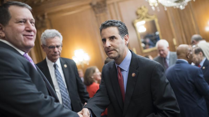 Rep. John Sarbanes, D-Md., (center of photo) is the lead author of the For The People Act that passed in the House on Friday. Rep. John Sarbanes, D-Md., (center of photo) is the lead author of the For The People Act that passed in the House on Friday.
