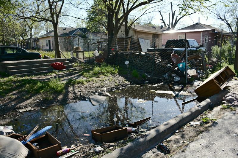 Standing water and abandoned tires make Houston's Fifth Ward hospitable for mosquitoes. Standing water and abandoned tires make Houston's Fifth Ward hospitable for mosquitoes.