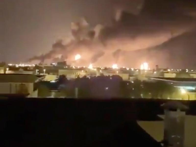 Smoke fills the sky at the Abqaiq oil processing facility on Saturday in Saudi Arabia. Smoke fills the sky at the Abqaiq oil processing facility on Saturday in Saudi Arabia.
