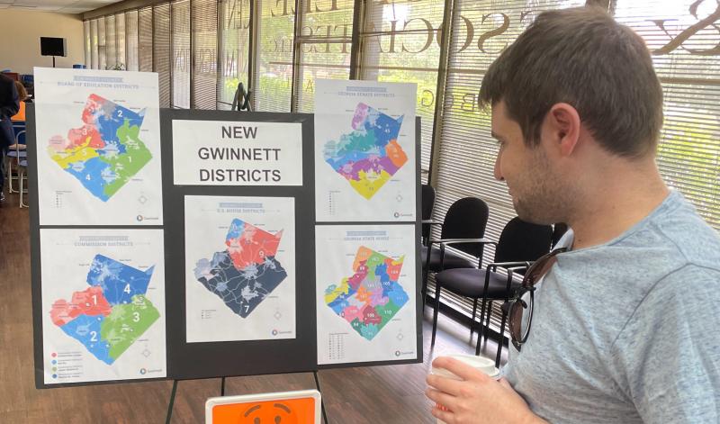 A man looks at newly drawn congressional districts for Gwinnett County, Ga., at a meeting of county Democrats this month. A man looks at newly drawn congressional districts for Gwinnett County, Ga., at a meeting of county Democrats this month.