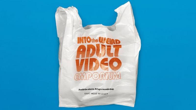 East West Market in Vancouver, British Columbia, offered single-use plastic bags with embarrassing slogans to encourage customers to utilize reusable bags. East West Market in Vancouver, British Columbia, offered single-use plastic bags with embarrassing slogans to encourage customers to utilize reusable bags.