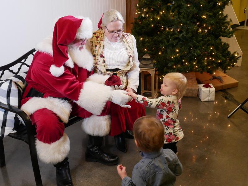 Keith and Melanie Hubbard, who portray Santa and Mrs. Claus in Oklahoma greet their grandchildren in 2019. Keith and Melanie Hubbard, who portray Santa and Mrs. Claus in Oklahoma greet their grandchildren in 2019.