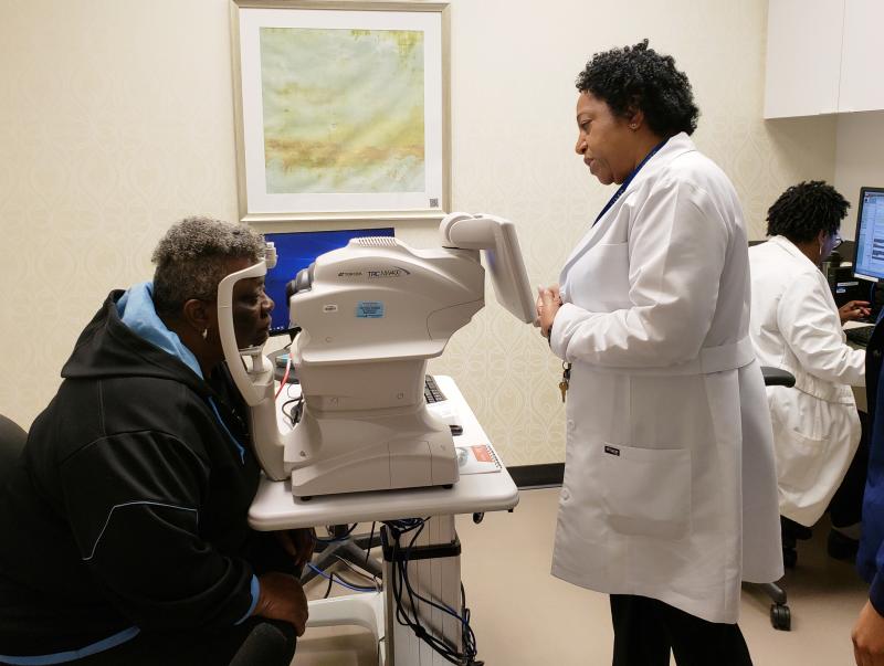 Nurse practitioner Debra Brown guides patient Merdis Wells through a diabetic retinopathy exam at University Medical Center in New Orleans. Nurse practitioner Debra Brown guides patient Merdis Wells through a diabetic retinopathy exam at University Medical Center in New Orleans.