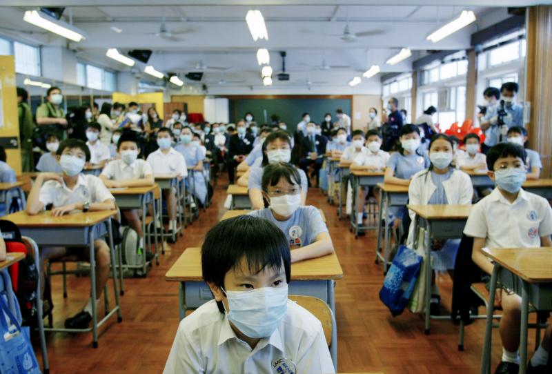 School was suspended for six weeks in Hong Kong as part of the strategy to keep SARS from spreading. On May 12, 2003, primary school children returned to class amid signs that the outbreak was coming under control. School was suspended for six weeks in Hong Kong as part of the strategy to keep SARS from spreading. On May 12, 2003, primary school children returned to class amid signs that the outbreak was coming under control.