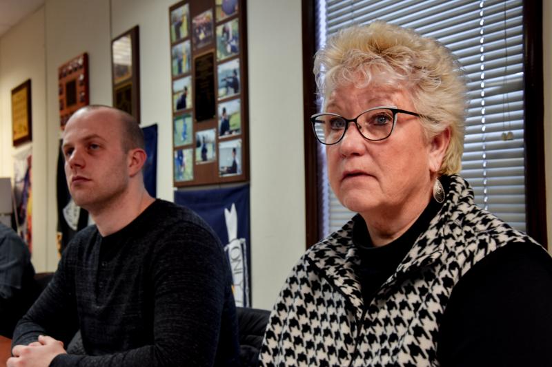 Patti Saylor sits next to David Roberts, an officer with the Calvert County Sheriff's Office, during a training session at Prince George's Community College. Patti Saylor sits next to David Roberts, an officer with the Calvert County Sheriff's Office, during a training session at Prince George's Community College.
