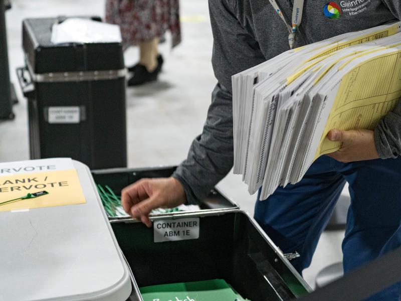 Georgia election workers begin their recount of ballots after the November election. Despite three recounts of the tally, former President Donald Trump and his allies falsely claim electoral fraud cost him the state. Georgia election workers begin their recount of ballots after the November election. Despite three recounts of the tally, former President Donald Trump and his allies falsely claim electoral fraud cost him the state.
