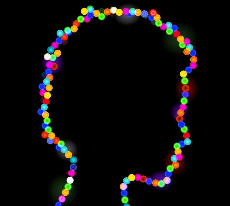 Colorful lights in the shape of a woman's head. Colorful lights in the shape of a woman's head.