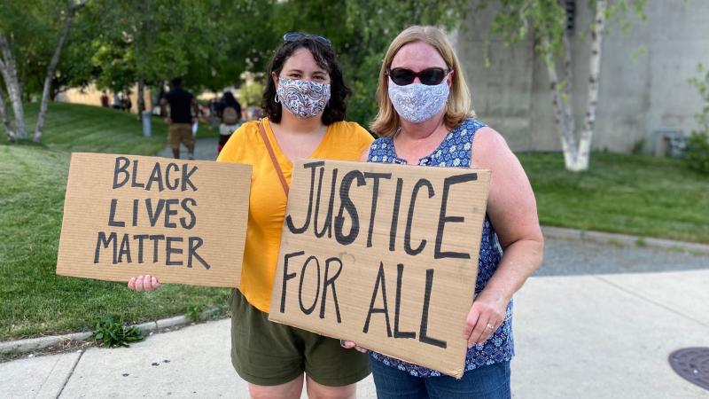 Susie Hall, right, and her daughter Rebekah attend a Juneteenth celebration. Susie Hall, right, and her daughter Rebekah attend a Juneteenth celebration.