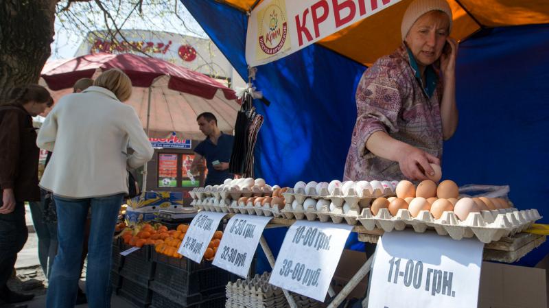 A street vendor in Simferopol, Crimea, sells eggs with the dual currency price tags in Russian rubles and Ukrainian hryvnias. Russia's annexation of Crimea mean it will now have to prop up the peninsula's weak economy. A street vendor in Simferopol, Crimea, sells eggs with the dual currency price tags in Russian rubles and Ukrainian hryvnias. Russia's annexation of Crimea mean it will now have to prop up the peninsula's weak economy.