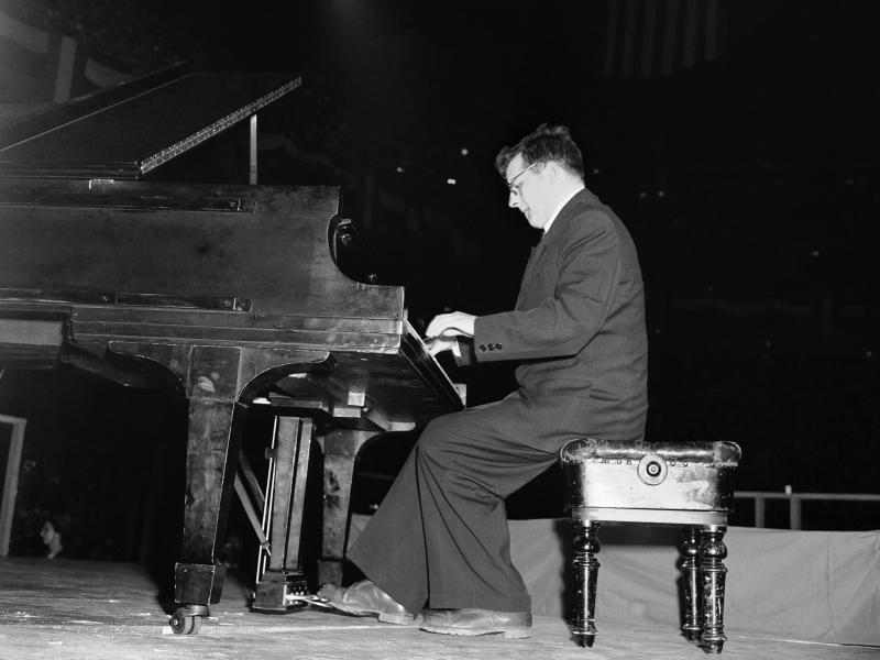 Dmitri Shostakovich, Russian composer-member of the Soviet delegation to the Cultural and Scientific conference for World Peace, plays the second movement of his Fifth Symphony at Madison Square Garden in New York City on March 27, 1949. Dmitri Shostakovich, Russian composer-member of the Soviet delegation to the Cultural and Scientific conference for World Peace, plays the second movement of his Fifth Symphony at Madison Square Garden in New York City on March 27, 1949.