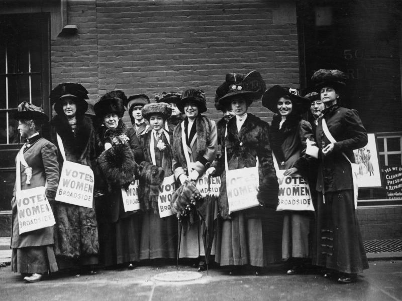 Members of the women's suffrage movement prepare to march on New York's Wall Street in 1913, armed with leaflets and slogans demanding the vote for women. Members of the women's suffrage movement prepare to march on New York's Wall Street in 1913, armed with leaflets and slogans demanding the vote for women.