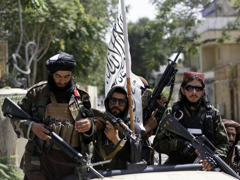 Taliban fighters patrol through Kabul, Afghanistan, on Thursday. Pictures of such fighters posing with captured aircraft, weapons and vehicles have been showing upon social media. Taliban fighters patrol through Kabul, Afghanistan, on Thursday. Pictures of such fighters posing with captured aircraft, weapons and vehicles have been showing upon social media.