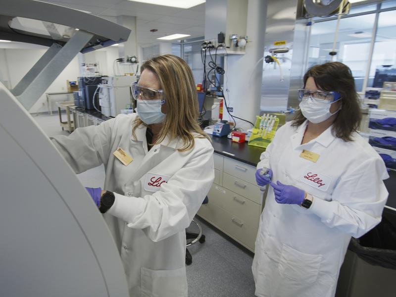Eli Lilly researchers prepare cells to produce possible COVID-19 antibodies in a laboratory in Indianapolis. The drugmaker has asked the U.S. government to allow emergency use of its experimental antibody therapy. Eli Lilly researchers prepare cells to produce possible COVID-19 antibodies in a laboratory in Indianapolis. The drugmaker has asked the U.S. government to allow emergency use of its experimental antibody therapy.