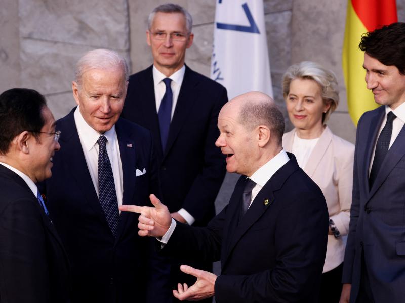 From left, Japan's Prime Minister Fumio Kishida, U.S. President Joe Biden and Germany's Chancellor Olaf Scholz speak as NATO Secretary General Jens Stoltenberg, back, European Commission President Ursula von der Leyen, and Canada's Prime Minister Justin T From left, Japan's Prime Minister Fumio Kishida, U.S. President Joe Biden and Germany's Chancellor Olaf Scholz speak as NATO Secretary General Jens Stoltenberg, back, European Commission President Ursula von der Leyen, and Canada's Prime Minister Justin T