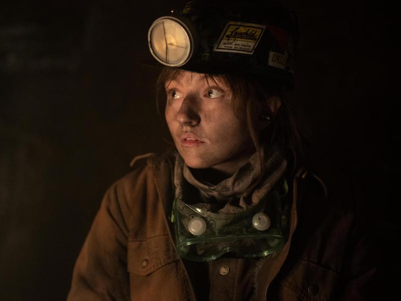 Kaitlyn Dever plays Betsy, a young miner who takes OxyContin for a back injury. Kaitlyn Dever plays Betsy, a young miner who takes OxyContin for a back injury.